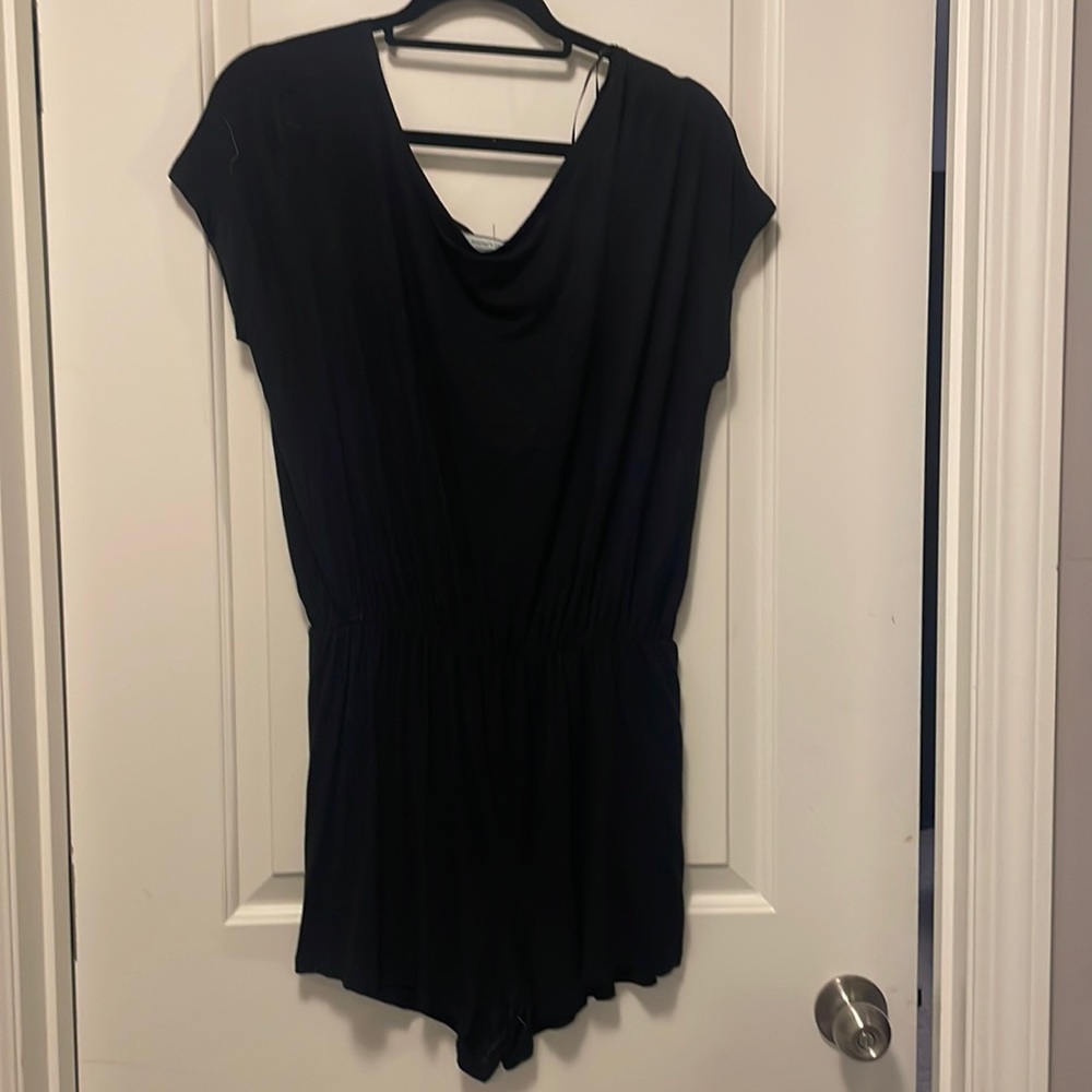 Cute black romper. Size large.